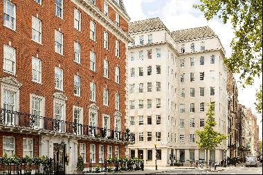A bright third floor three bedroom apartment for sale on one of Mayfair's most prestigious
