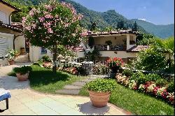 Large Mediterranean luxury villa for sale in Lugano-Morcote, just steps from Lake Lugano