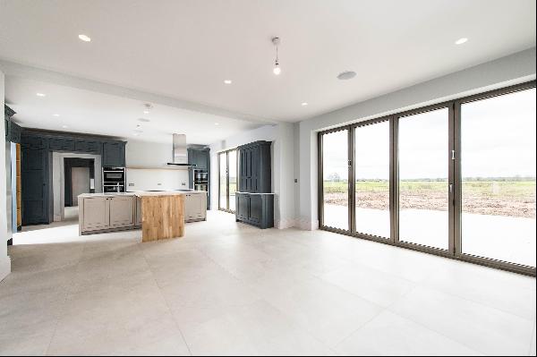 A newly built contemporary home is one of three in this new development. It has beautiful 