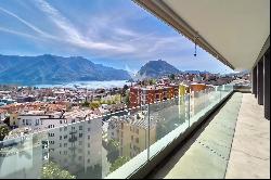 Lugano: duplex-penthouse for sale with large rooftop terrace & enchanting 180 open view 