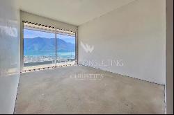 Lugano: duplex-penthouse for sale with large rooftop terrace & enchanting 180 open view 