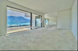 Lugano: duplex-penthouse for sale with large rooftop terrace & enchanting 180 open view 