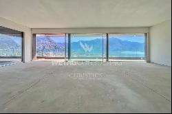 Lugano: duplex-penthouse for sale with large rooftop terrace & enchanting 180 open view 