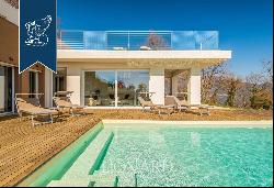 Designer villa for sale with a wonderful panoramic view of Versilia's sea