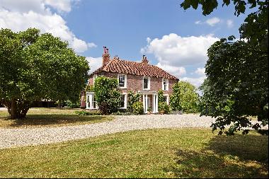 A charming Grade II listed country house in a private setting with an extensive range of o