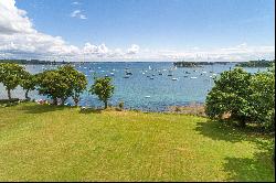 The feet in the water, breathtaking view of the Gulf of Morbihan and its islands