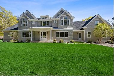 Nestled on 4+ acres on a very private street, this new 6,000 Sq.Ft. house is beautifully b