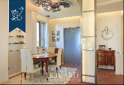 Elegant estate surrounded by a private garden with a pool on the outskirts of Milan