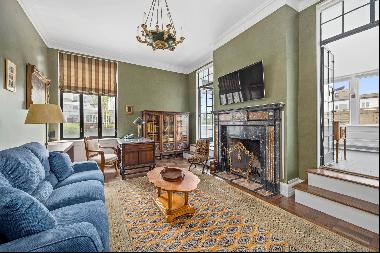Sun-flooded dream penthouse situated at the top of one of Park Avenue's most coveted coope