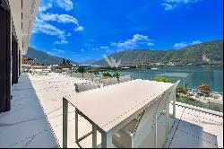 Modern penthouse with large terrace & enchanting lake view for sale in Lugano - Bissone