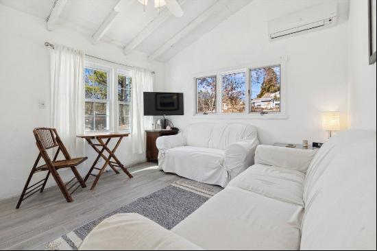 Cute as a button and newly furnished is this two bedroom, one bath, rustic getaway only on