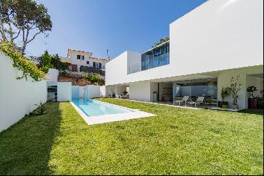 Contemporary four bedroom house in Estoril, designed by the architect Aires Mateus