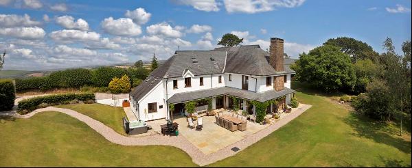 Elegant and substantial country house with period proportions, designed in the Arts and Cr