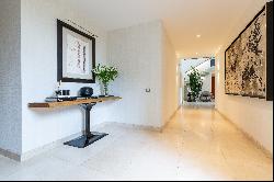 Duplex with private garden located in an exclusive condominium in La Dehesa