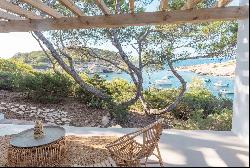 Charming seafront Villa for rent overlooking the tranquil bay of Portinatx