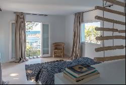 Charming seafront Villa for rent overlooking the tranquil bay of Portinatx