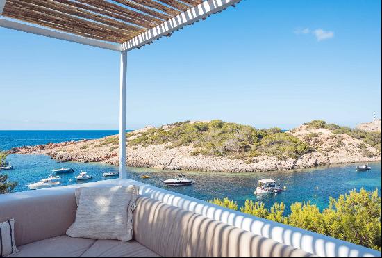 Charming seafront Villa for rent overlooking the tranquil bay of Portinatx