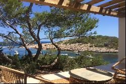 Charming seafront Villa for rent overlooking the tranquil bay of Portinatx