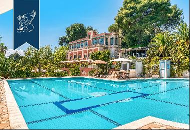 Luxury boutique hotel for sale surrounded by a 1.75-hectare park with a pool