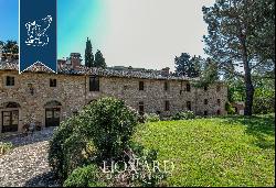 Luxury relais for sale on the sweet rolling hills between Siena and San Gimignano