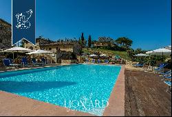 Luxury relais for sale on the sweet rolling hills between Siena and San Gimignano