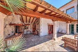 High quality Mediterranean villa in center of Es Capdellà with mountain views