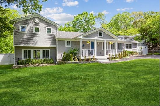 Located on a private village lane just minutes to Sag Harbor village this graciously sized