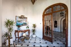 Historic colonial Art Deco manor house with an old mill, Menorca