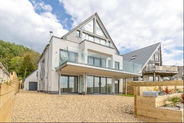 A stunning contemporary home being built to a high standard in a prime position on the sea