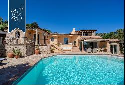 Luxury villa surrounded by a wonderful leafy garden in Porto Cervo's marina.