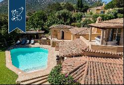 Luxury villa surrounded by a wonderful leafy garden in Porto Cervo's marina.