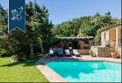 Luxury villa surrounded by a wonderful leafy garden in Porto Cervo's marina.