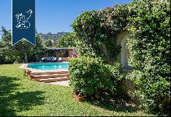 Luxury villa surrounded by a wonderful leafy garden in Porto Cervo's marina.