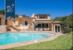 Luxury villa surrounded by a wonderful leafy garden in Porto Cervo's marina.