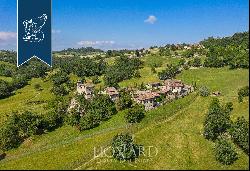 Complex for sale in a high, strategic position to reach Milan and Liguria