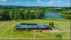 Unique homestead at the foot of Kernave mounds, that comes with a plane