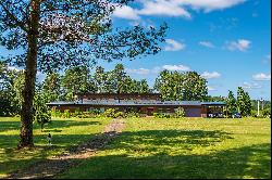 Unique homestead at the foot of Kernave mounds, that comes with a plane