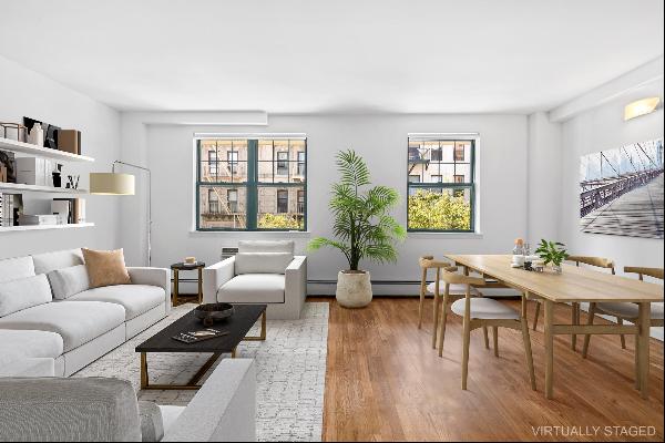 Experience the vibrancy of the East Village in this unique, newly renovated duplex condo f