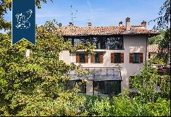 Prestigious real estate complex with a pool in a panoramic position on Varese's hills