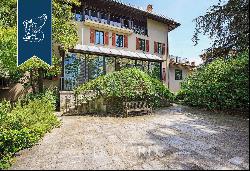 Prestigious real estate complex with a pool in a panoramic position on Varese's hills