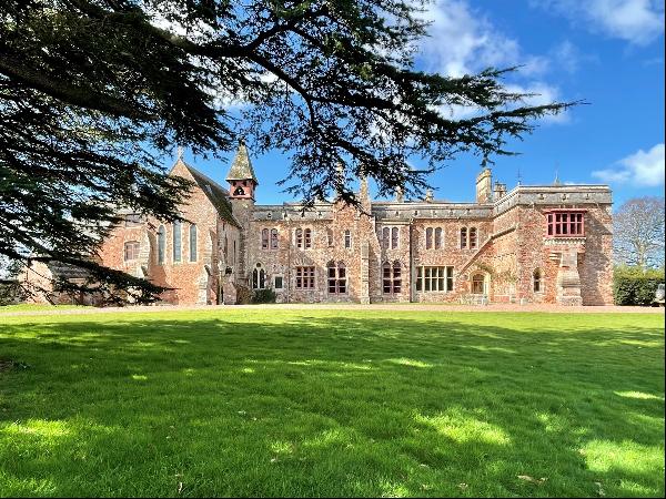 A fascinating Grade I listed country house set in over 30 acres of parkland, with chapel, 