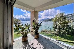 Lugano-Muzzano: charming penthouse apartment for sale, directly by the lake & with roof t