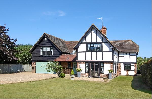 A superb family home with views over open fields.