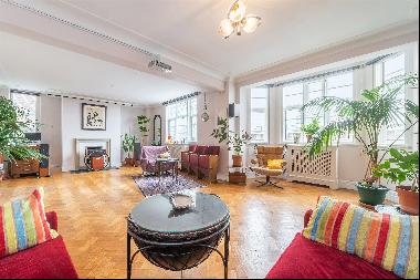 A 3 bedroom flat for sale on College Crescent, NW3.