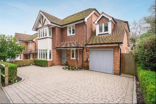 A quality, detached five bedroom home located in Virginia Water.