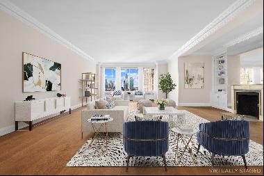 Stunning East River and Southwest city views greet you from this elegant and expansive 9 r