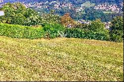 Beautiful land plot with view of Lake Lugano for sale in Porza