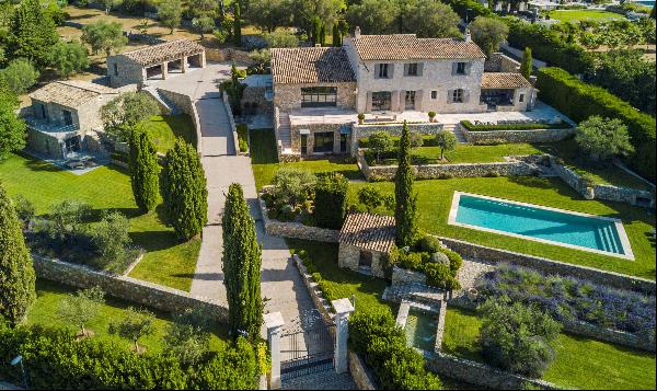 An elegantly appointed stone villa for sale in Mougins with views over the Riviera's count