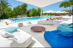 Luxury villa with sea views in Cala Tarida, tennis court