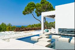 Luxury villa with sea views in Cala Tarida, tennis court